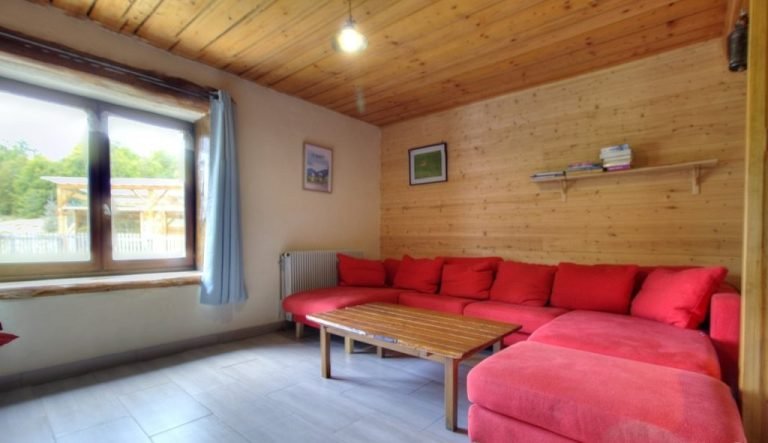 Lounge area with red sofa